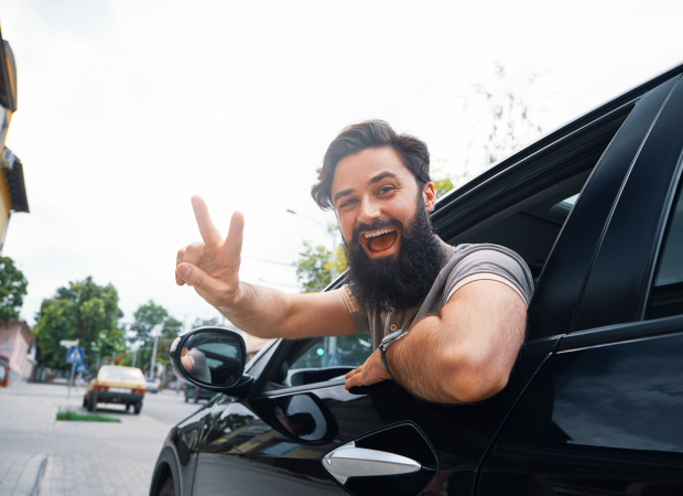 close-up-side-portrait-happy-man-driving-car close-up-side-portrait-happy-man-driving-car